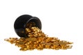 Pot of gold coins spilling over onto white background isolated Royalty Free Stock Photo