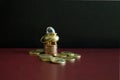 A pot of gold on top of some stacked coins Royalty Free Stock Photo