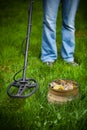 Pot of golden coins collected with metal detector Royalty Free Stock Photo