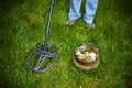 Pot of golden coins collected with metal detector