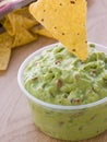 Pot Of Guacamole With A Corn Tortilla Crisp