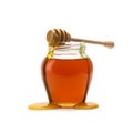 Pot of honey with wooden drizzler