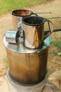 Pot of hot water boiler on wood fueled stove with coffee filter