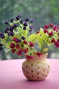 Pot of plastic flowers