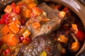 Pot roast pork meat with minced vegetables. Royalty Free Stock Photo