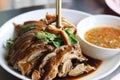 Pot-stewed duck with chilli sauce.