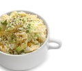 Pot with tasty boiled rice and avocado on white background Royalty Free Stock Photo