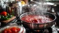 Pot of tomato sauce simmering on the stove, with steam rising from the pot. Nice texture and deep red color.