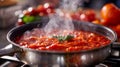 Pot of tomato sauce simmering on the stove, with steam rising from the pot. Nice texture and deep red color.