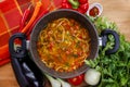 Pot of tomato soup and fresh vegetables Royalty Free Stock Photo
