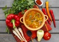 Pot of tomato soup and fresh vegetables Royalty Free Stock Photo
