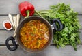 Pot of tomato soup and fresh vegetables Royalty Free Stock Photo