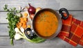 Pot of tomato soup and fresh vegetables Royalty Free Stock Photo