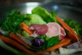 Pot with vegetables on soup meat onion leek parsley cabbage lunch Royalty Free Stock Photo