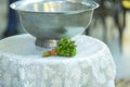 A pot of water in which the child to be baptized is immersed. Royalty Free Stock Photo