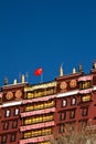 Potala Palace Lhasa Tibet with Chinese flag