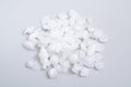 Potassium hydroxide or caustic potash on light grey background