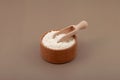 Potassium sorbate or potassium salt of sorbic acid in wooden bowl. Food additive E202 widely used in food industry, especially in
