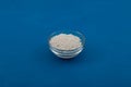 Potassium sorbate, potassium salt of sorbic acid in glass bowl. Food additive E202 used in many personal-care products to inhibit