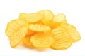 Slices of crinkle-cut potato chips are arranged in a pile. Royalty Free Stock Photo