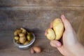 Potato banner, ugly potatoes on a wooden background. Potato heart