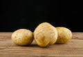 Potato on a black background Royalty Free Stock Photo
