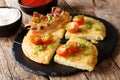 Potato Boxty with bacon, tomatoes, onions and sauce close-up. ho Royalty Free Stock Photo