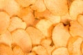 Potato chips background. Fast Food snack texture Royalty Free Stock Photo