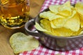 Potato chips and beer Royalty Free Stock Photo
