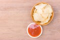 potato chips on bowl and catchup