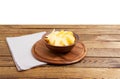 Potato chips on empty wooden table isolated on white background copy space Royalty Free Stock Photo