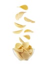 Potato chips in a glass plate on a white background Royalty Free Stock Photo