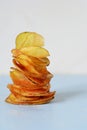Natural potato chips with sea salt on a light background. Diet. Royalty Free Stock Photo