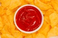 Potato chips and ketchup. Beer snack, unhealthy eating