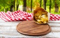 Potato chips pack, pizza desk and table cloth on blurred park background Royalty Free Stock Photo