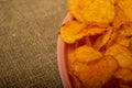 Potato chips on a round platter. Close up Royalty Free Stock Photo