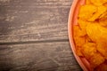 Potato chips on a round platter. Close up Royalty Free Stock Photo