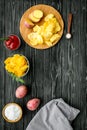 Potato chips served with ketchup and salt on wooden background top view Royalty Free Stock Photo