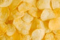 Potato chips snack as background image texture background. Top view. Copy, empty space for text Royalty Free Stock Photo