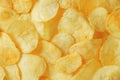 Potato chips snack as background image texture background. Top view. Copy, empty space for text Royalty Free Stock Photo