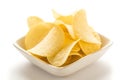 Potato chips in a white bowl Royalty Free Stock Photo