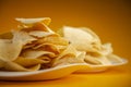 Potato chips on white plate Royalty Free Stock Photo