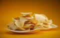 Potato chips on white plate Royalty Free Stock Photo