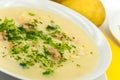 Potato cream soup with chopped meat balls