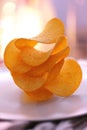 Potato crisps on plate Royalty Free Stock Photo