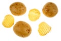 Potato crisps and potatoes Royalty Free Stock Photo