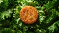 Potato croquettes on a green lettuce leaf on a black background