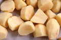 Potato cut off piece befor cocking Royalty Free Stock Photo