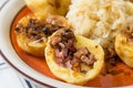 Potato dumplings with smoked meat and fried onion,cabbage. Royalty Free Stock Photo