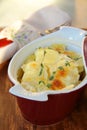 Potato gratin dauphinoise in the pan on rustic bac Royalty Free Stock Photo